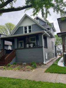 Home in Oak Park with new vinyl siding and marvin windows